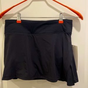 Black, Play off the Pleats skirt